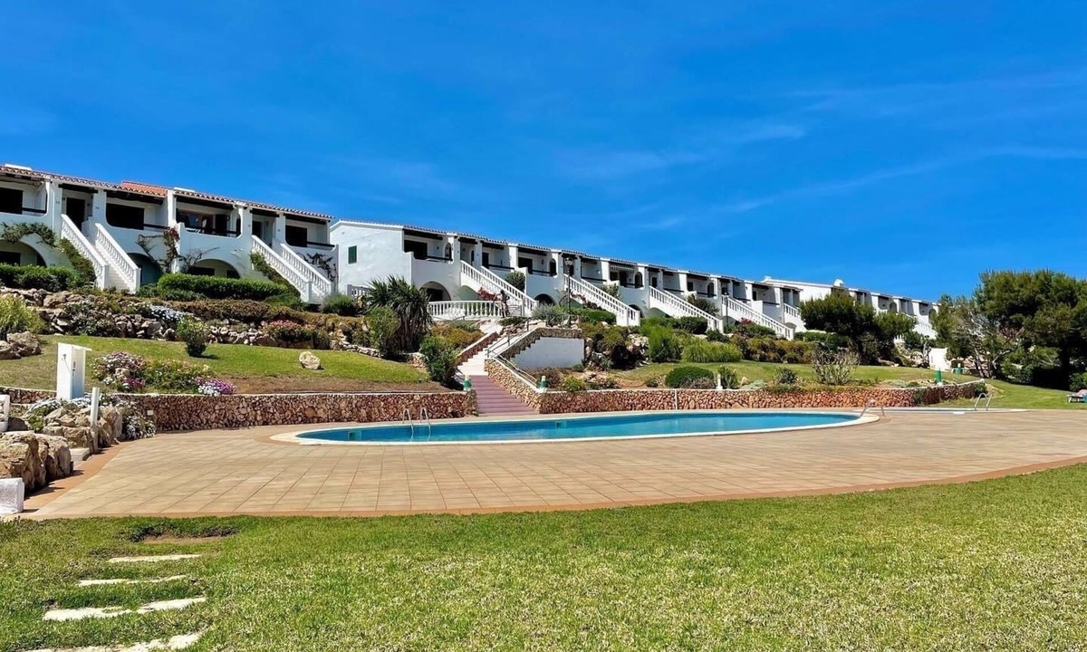 Arenal d'en Castell Apartment | 2 bedroom Apartment With Pool, Shared Gardens And Sea Views