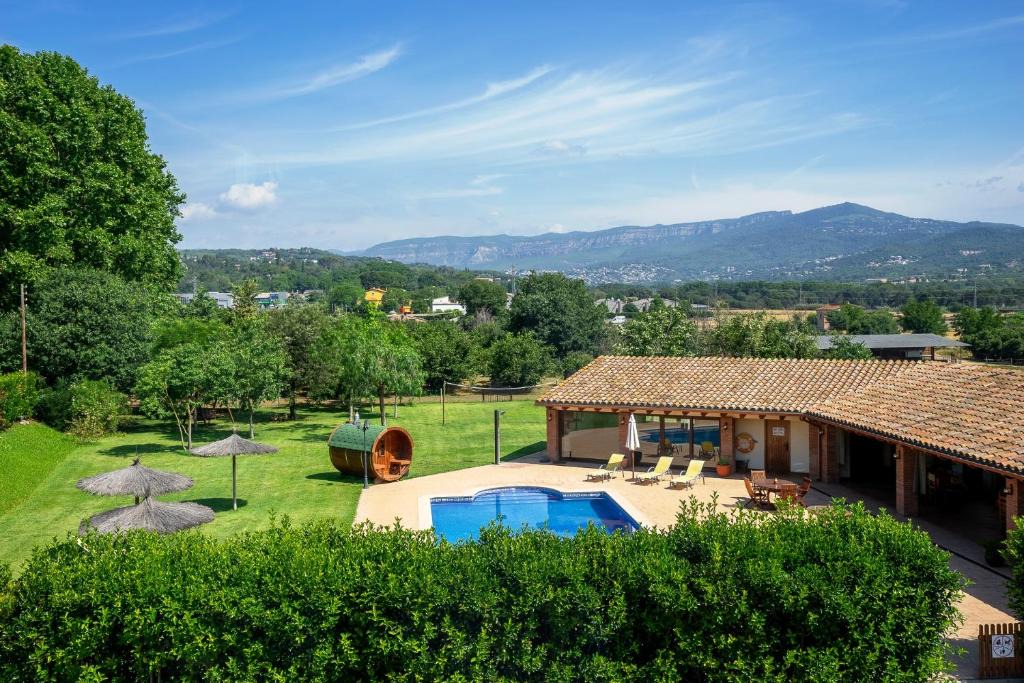 Santa Eulalia de Roncana Apartment | Agroturisme Can Burguès