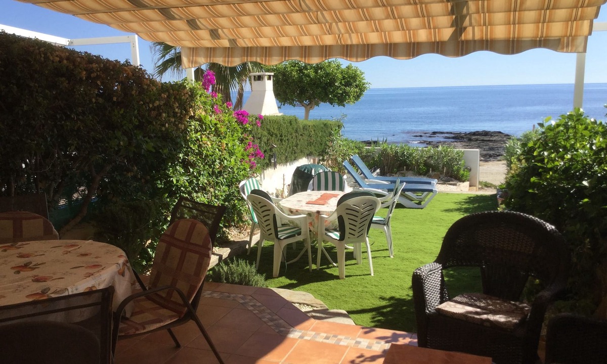 Cala Panizo House | Beach front 3 double bedroom house, pool, pets, garden 40' from sea. NEW BBC ITV
