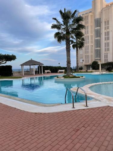 Coveta Fuma Apartment | Beachfront apartment with Sea Views, Pool, Parking