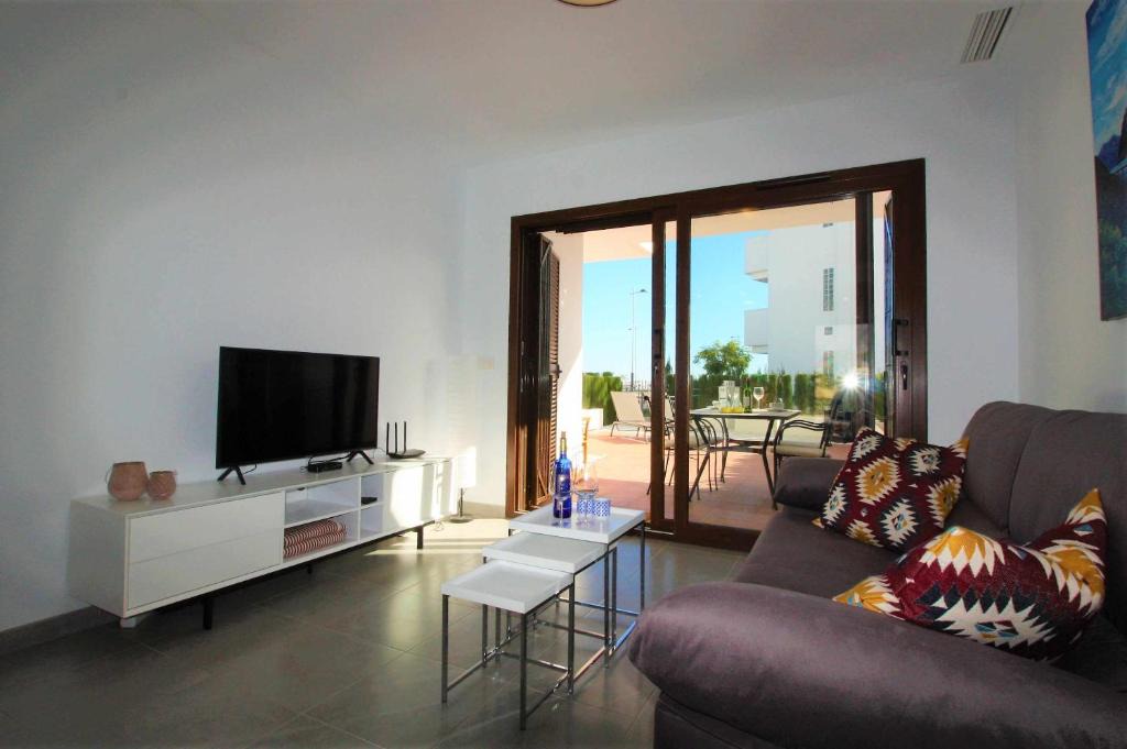 Mar de Pulpi Apartment | Casa Tapas y vino apartamento con jardin y piscina comunitaria