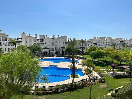 Roldan Apartment | Cozy apartment at La Torre Golf Resort - AE2221LT