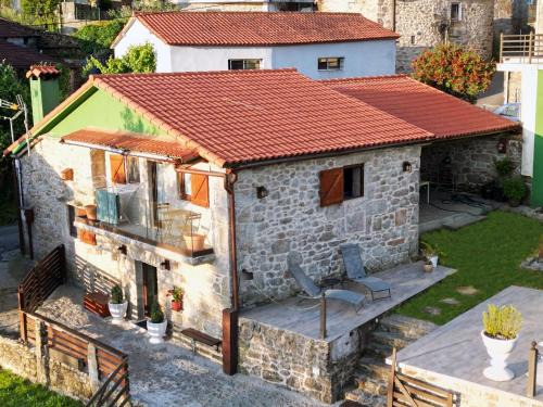 Cerdedo House | Cozy Galician Stone Farmhouse with Fireplaces and Pool