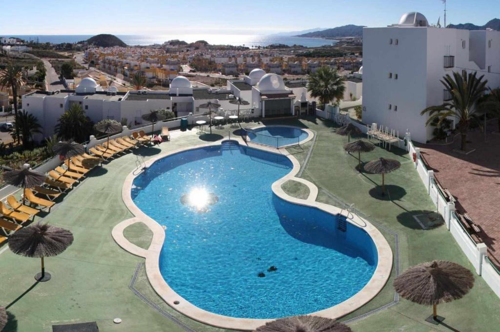 Pulpi Apartment | Estrelitzia apartamento con vista panorámica al mar y piscina comunitaria