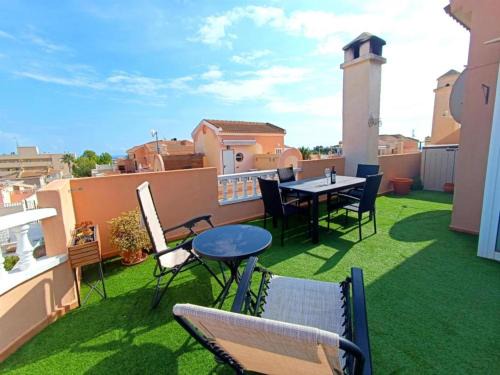 Orihuela Costa Apartment | Green Veranda - cosy apartment with terrace, grill, chimney and pool
