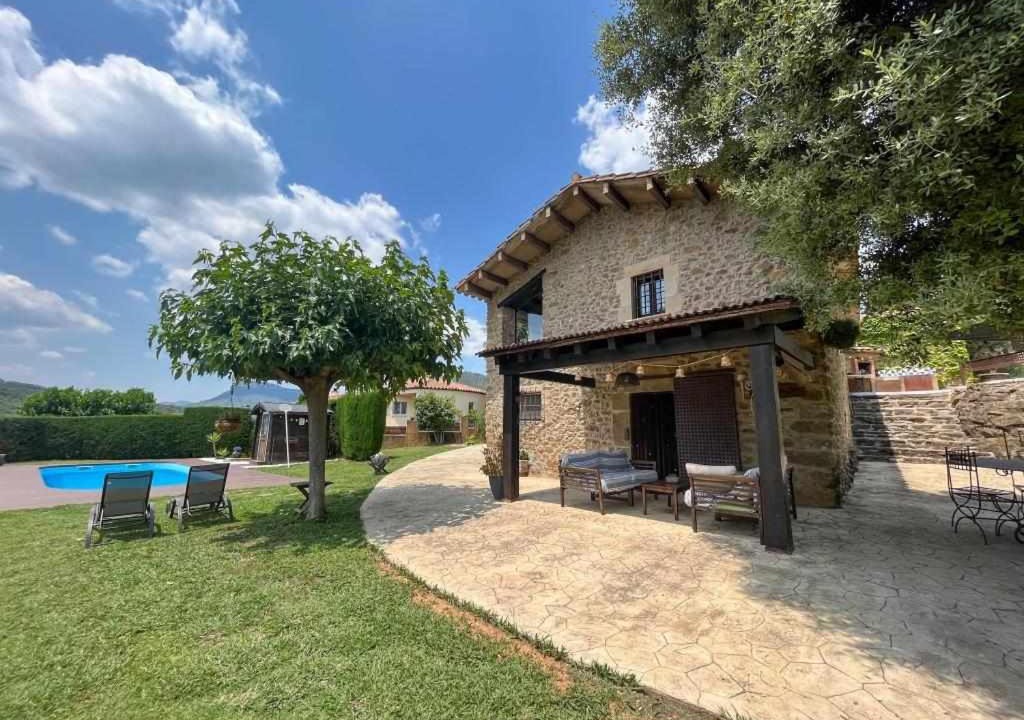 Sant Marti de Llemena Girona House | Masia with pool and beautiful views near Girona