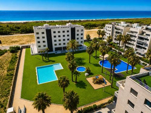 Torredembarra Apartment | Planta baja en Nova Torredembarra con 3 piscinas