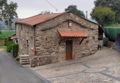 Curtis House | Stone Cottage La COMPOSTELANA