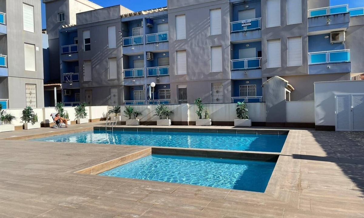Torrevieja Apartment | Villa 'R-60-A Maestro' with Shared Pool, Wi-Fi and Air Conditioning