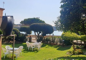 Apartment with garden at 11 meters from the sand beach of la Fosca.