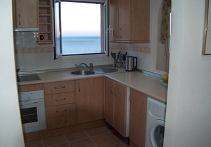 South facing apartment - spectacular sea & mountain views with communal pool.