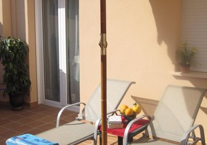 South facing apartment - spectacular sea & mountain views with communal pool.