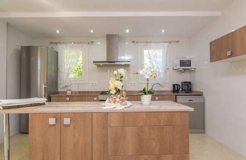 Alcanada House | BELL-PUNT - Comfy seafront beach house with private terrace and garden. Free WiFi