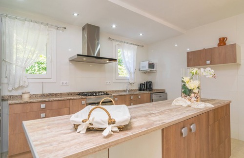 Alcanada House | BELL-PUNT - Comfy seafront beach house with private terrace and garden. Free WiFi