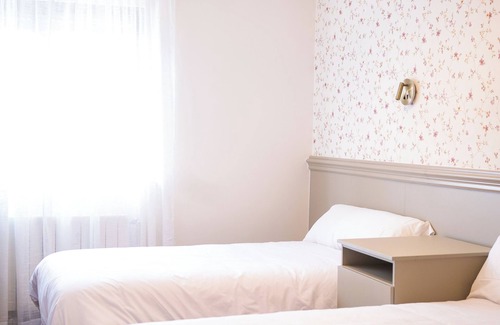 Vecinos Hostel | El Portón de la Huebra