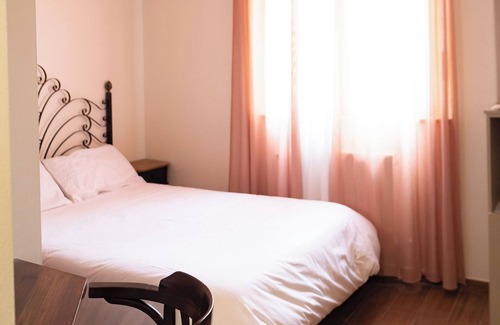 Vecinos Hostel | El Portón de la Huebra
