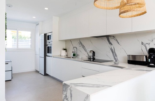 Carihuela House | Modern Two-Floor Townhouse Next to the Beach