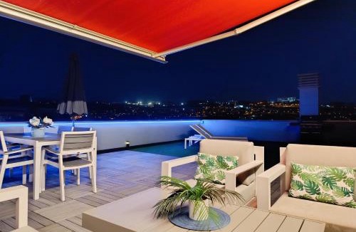 Lavadores Apartment | Ático Chill-Out de lujo con piscina y garaje gratis