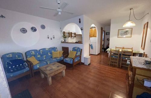 Arenal d'en Castell Apartment | 2 bedroom Apartment With Pool, Shared Gardens And Sea Views