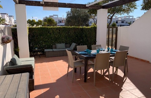 Alhama de Murcia Apartment | A fresh modern apartment on a lovely garden with a shared pool