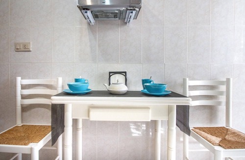 Los Alcazares Apartment | A homey vacation rental with heartfelt details and colorful furnishings.