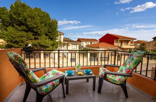 Los Alcazares Apartment | A homey vacation rental with heartfelt details and colorful furnishings.