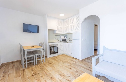 Sant Jaume Mediterrani Apartment | Apartment 'Son Bou Gardens Deluxe 2' with Shared Pool, Wi-Fi and Air Conditioning
