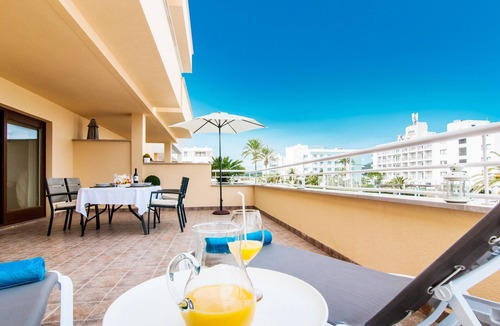 Cala Agulla Apartment | Apartment “Drac Blanc 1-3” with Sea View, Balcony, Garden & Air Conditioning