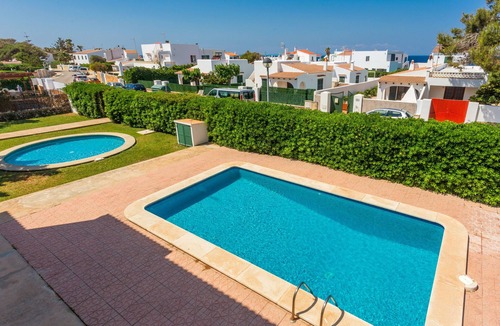 Cala Blanca Apartment | Apartment 'Delfín 8' with Shared Pool, Wi-Fi, and Air Conditioning