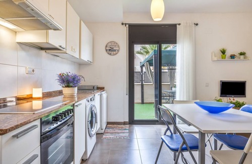 Sant Jaume d'Enveja Apartment | Apartment 'Gran Terraza Marita' with Shared Pool, Wi-Fi and Air Conditioning