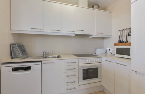 Coves Noves Apartment | Apartment 'Infinity View Menorca' with Sea View, Shared Pool and Private Terrace