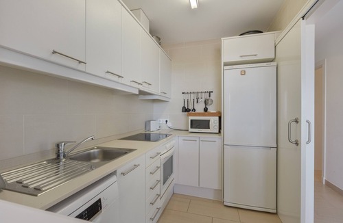 Coves Noves Apartment | Apartment 'Infinity View Menorca' with Sea View, Shared Pool and Private Terrace