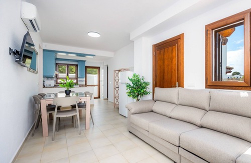 Cala d'Or Apartment | Apartment La Perla de Cala d'Or 9 with Shared Pool, Garden & Wi-Fi