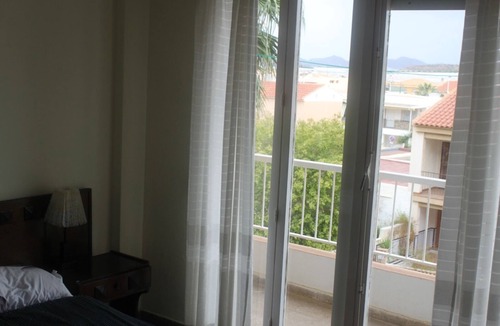 Puerto de Mazarron Apartment | Apartment 'Reya' with Private Terrace, Shared Garden and Wi-Fi
