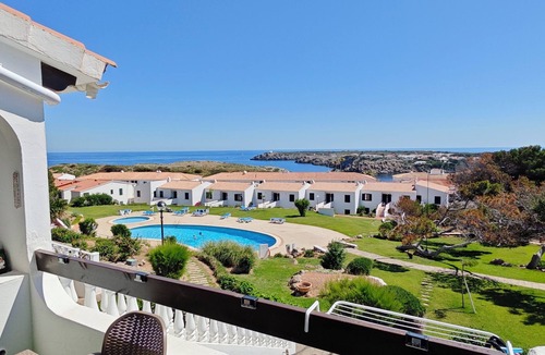 Arenal d'en Castell Apartment | Apartment with Private Pool, Garden and Sea Views