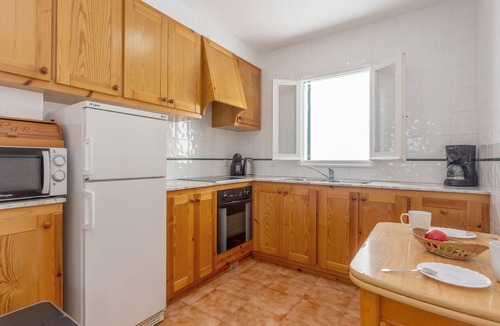 Arenal d'en Castell Apartment | Apartment "White Sands 613" close to the Beach with Sea View, Pool & Wi-Fi