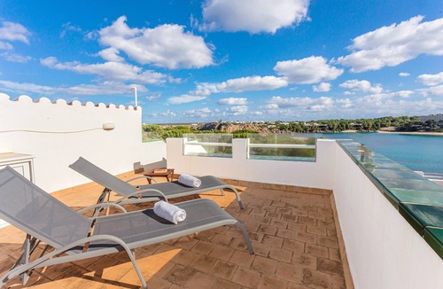 Arenal d'en Castell Apartment | Apartment "White Sands 613" close to the Beach with Sea View, Pool & Wi-Fi