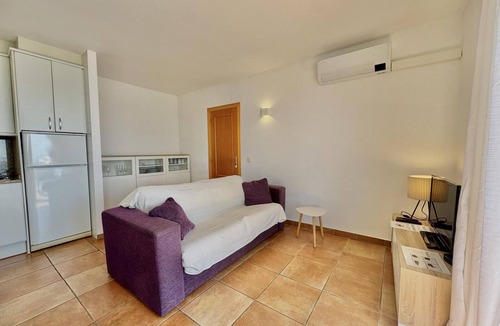 Almadraba-Canyelles Apartment | Apartment with pool, AC, and parking 700m from the beach in Roses