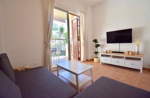 Puerto Rey Apartment | Bahia Marinas - Tu hogar con jardín privado!