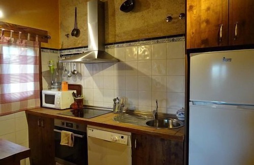 Torreiglesias Cottage | Balcony of Nut I: private garden of 500 m2, wifi, barbecue, fireplace, pets.