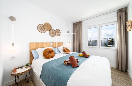 Punta Prima Apartment | Beachfront Bliss apt, with heated pool, by OYOOSTAYS