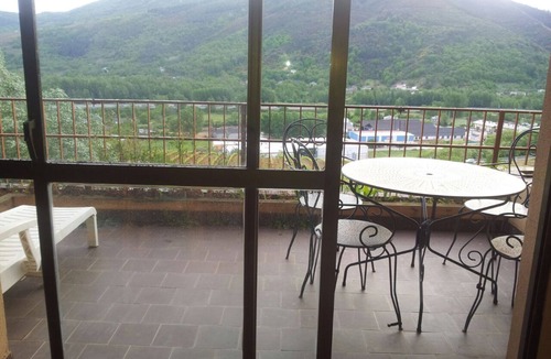 Villafranca del Bierzo Apartment | Beautiful apartment with views of the mountains and pool.