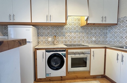 Arenal d'en Castell Apartment | Beautiful Apartment with Wi-Fi, Pool, Terrace and Sea View