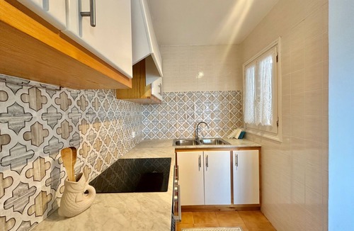 Arenal d'en Castell Apartment | Beautiful Apartment with Wi-Fi, Pool, Terrace and Sea View
