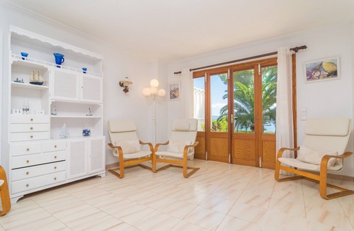 Alcanada House | BELL-PUNT - Comfy seafront beach house with private terrace and garden. Free WiFi