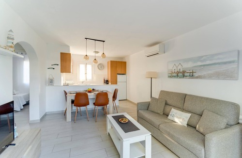 Cala'n Bosch Apartment | Can Xala - Flat with a swimming pool near the sea