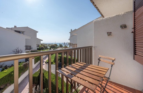 Miami Platja Apartment | 'Casita Blanca Seafront Apartment' with Sea Views, Pool, Air Conditioning, and Wi-Fi