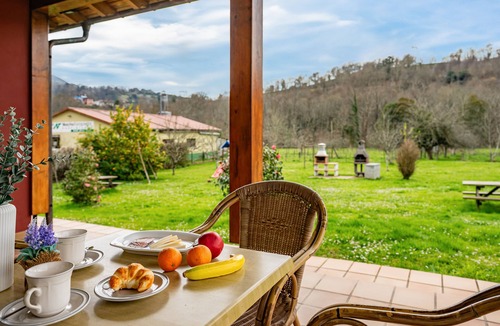 San Juan de Parres Apartment | Chalet 'Les Cuartes 1' with Mountain Views, Private Terrace and Private Garden