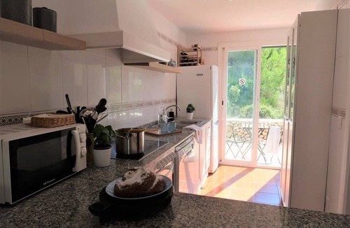 Arenal d'en Castell House | Charming 3-bedroom house with a pool and parking, right next to the beach (Wi-Fi, AC)