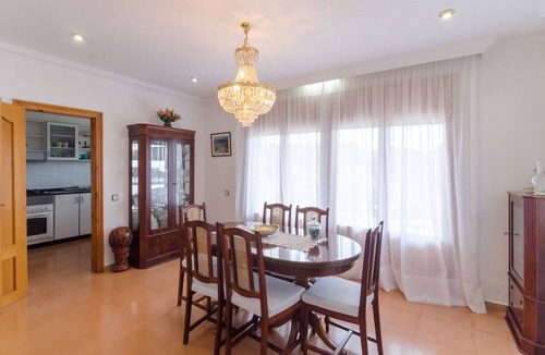 Sils Villa | Club Villamar - The lower part (pool level) has a dining room and a kitchen.